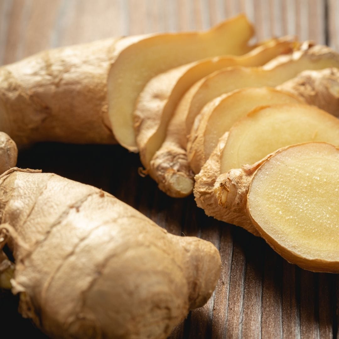 fresh-ginger-root-sliced-wooden-table1